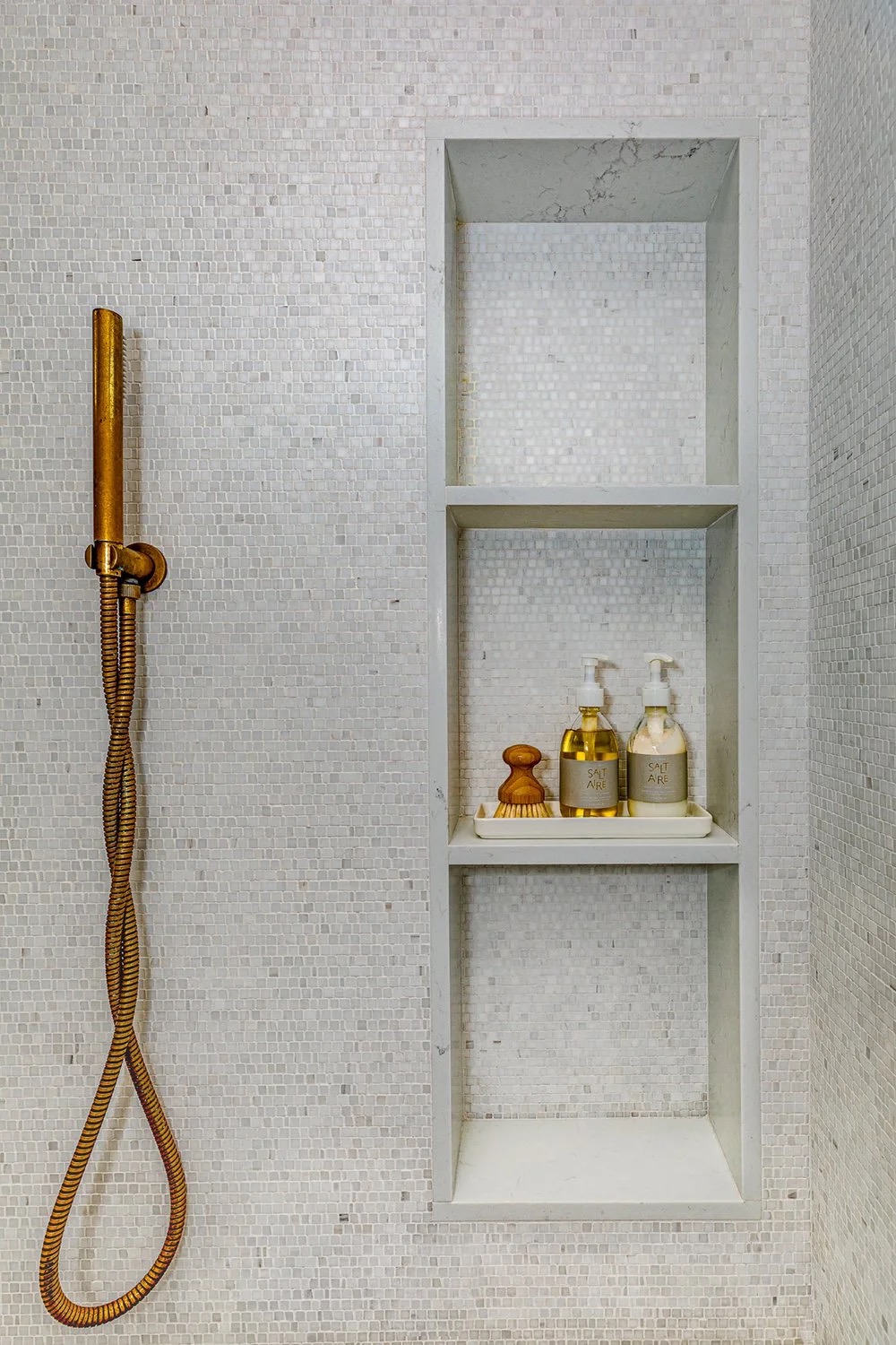 Saddle House, primary shower detailing in the project by KADI Design