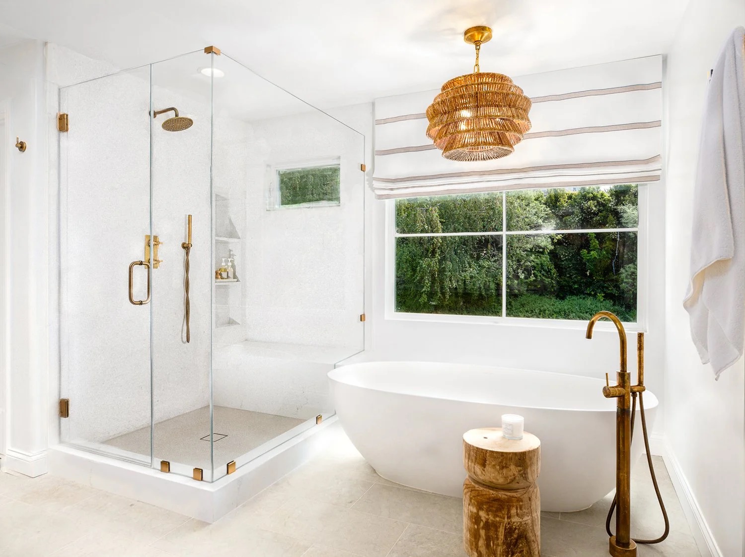 Saddle House, primary shower and tub in the project by KADI Design