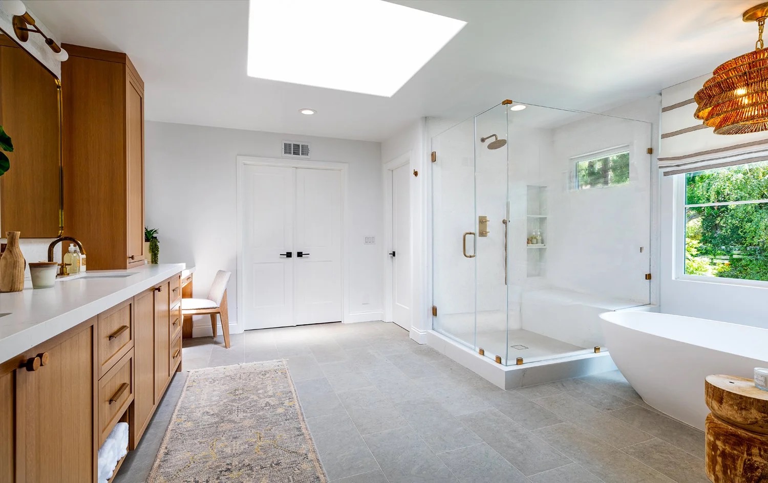 Saddle House, full primary bathroom in the project by KADI Design